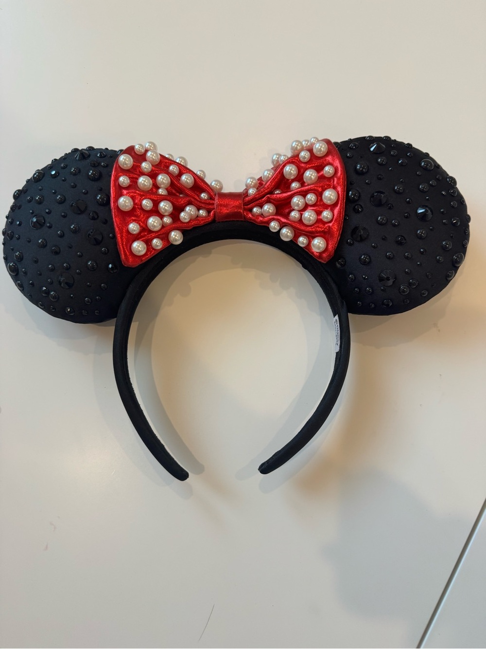BaubleBar Kids Black Ear Headband with Red Pearl Bow